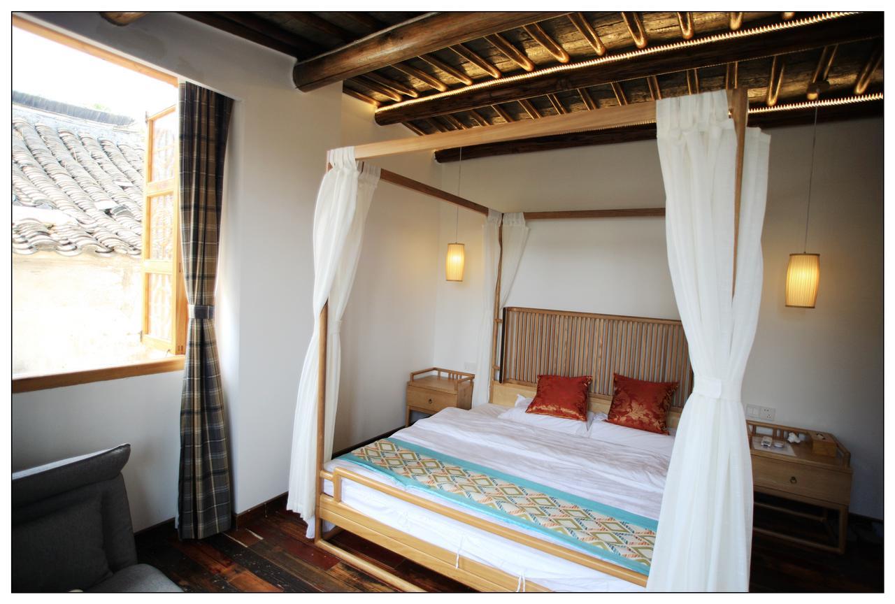 סוג'ואו Begonia Flowers Guesthouse מראה חיצוני תמונה
