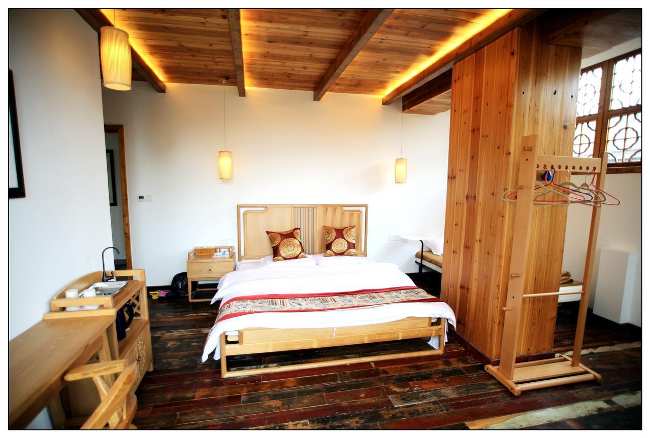 סוג'ואו Begonia Flowers Guesthouse מראה חיצוני תמונה