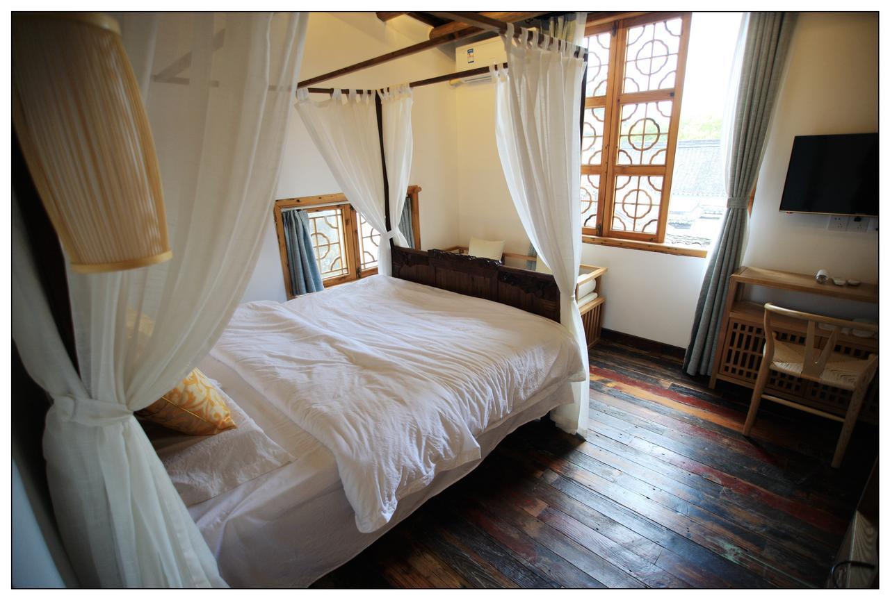 סוג'ואו Begonia Flowers Guesthouse מראה חיצוני תמונה
