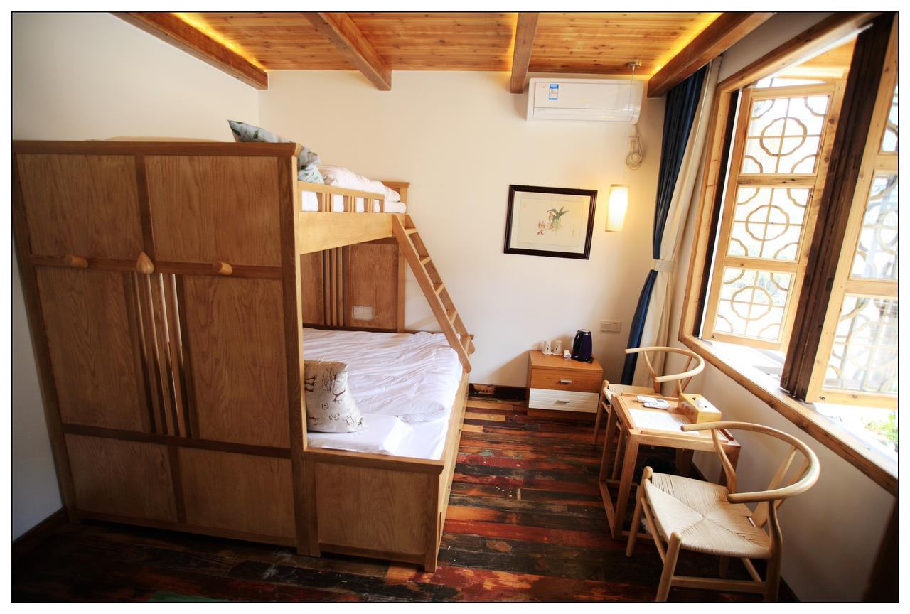סוג'ואו Begonia Flowers Guesthouse מראה חיצוני תמונה