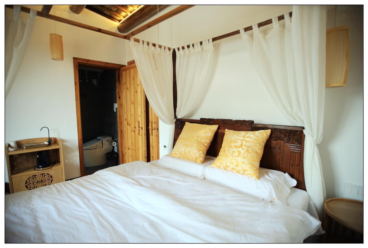 סוג'ואו Begonia Flowers Guesthouse מראה חיצוני תמונה