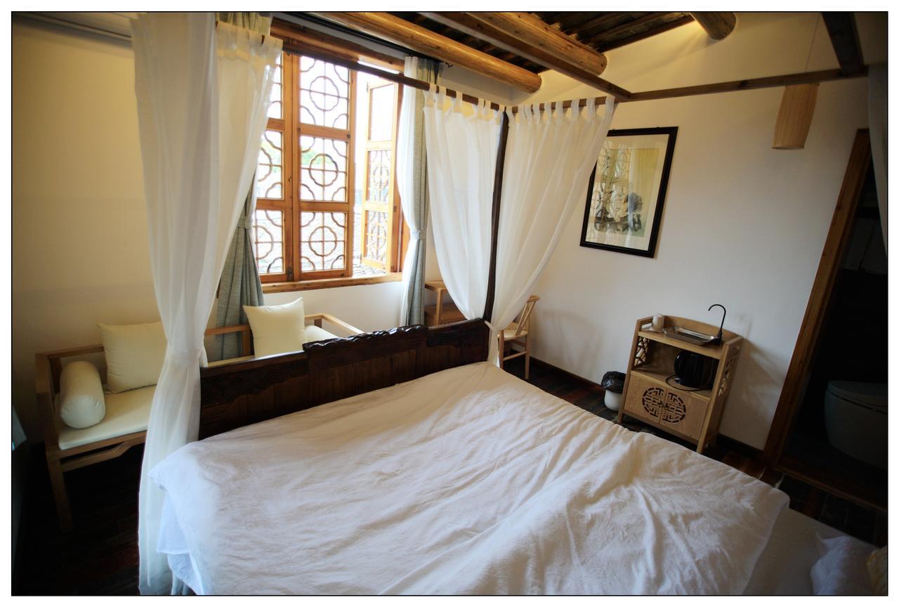 סוג'ואו Begonia Flowers Guesthouse מראה חיצוני תמונה