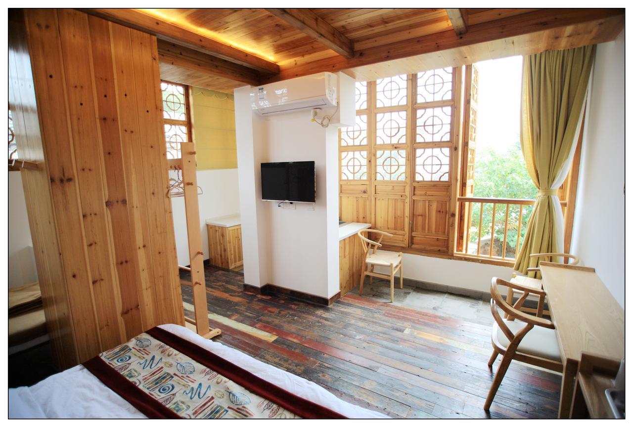 סוג'ואו Begonia Flowers Guesthouse מראה חיצוני תמונה