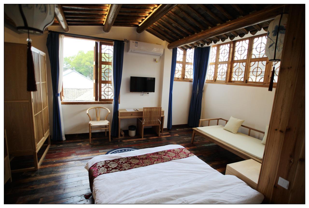 סוג'ואו Begonia Flowers Guesthouse מראה חיצוני תמונה